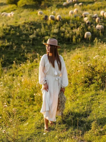Milky-white embroidered dress with a belt