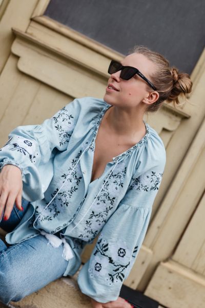 &ldquo;Nebesna&rdquo; Vyshyvanka &mdash; a light blue blouse with floral embroidery