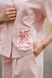 A powder-pink suit with embroidery