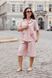A powder-pink suit with embroidery